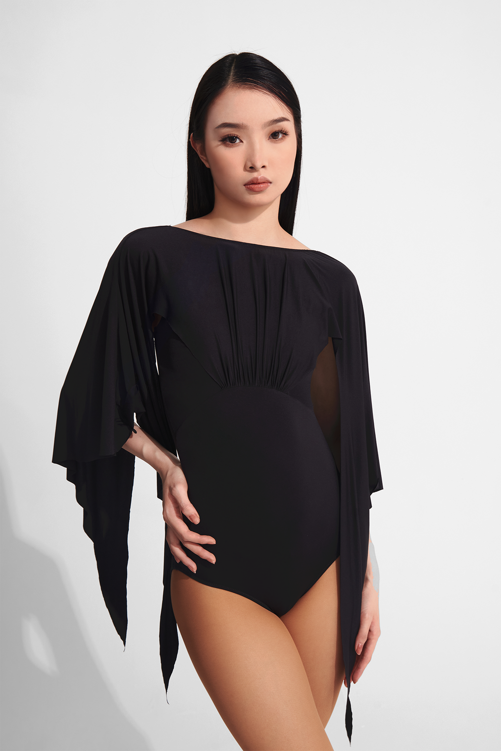 Get ready to dance like a queen in this stunning leotard from DANCE QUEEN! Featuring a pleated boat neck design, this leotard offers both style and comfort.