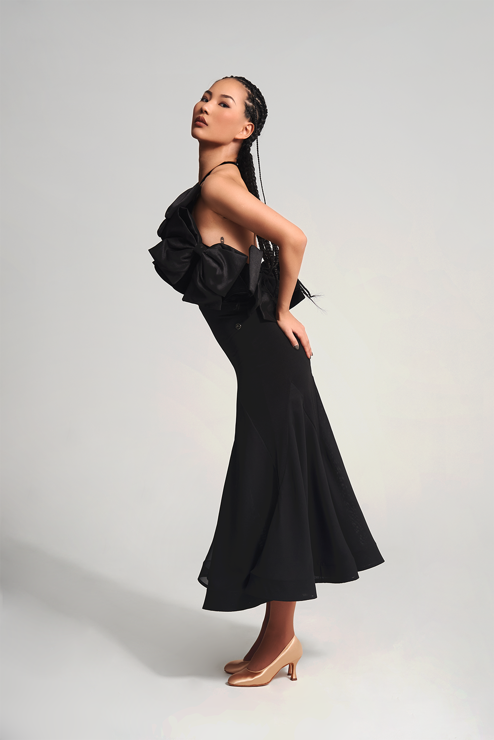 The DANCE QUEEN 696 Hollow Bow Black Custom Dress Made with high-quality comfort fabric and featuring a unique hollow bow design, this dress is available in both black and white bow, giving you the option to customize your look.&nbsp;