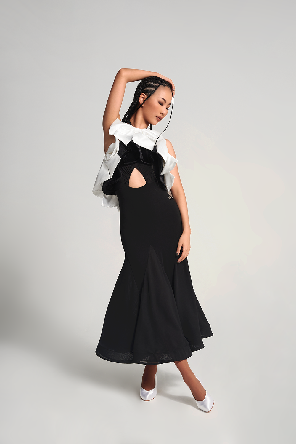 The DANCE QUEEN 696 Hollow Bow Black Custom Dress Made with high-quality comfort fabric and featuring a unique hollow bow design, this dress is available in both black and white bow, giving you the option to customize your look.&nbsp;