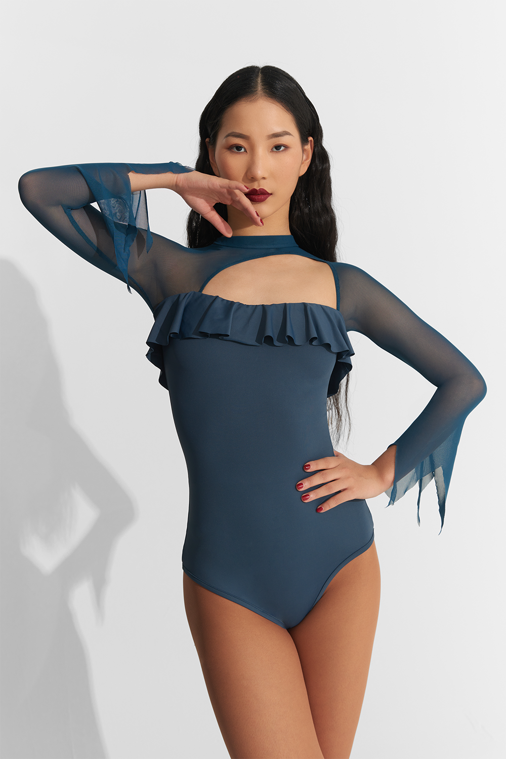 Experience the ultimate in comfort and style with the DANCE QUEEN 752 Blue Hollow Pleated Leotard. Designed for dancers, this leotard features a flattering hollow pleated design that allows for maximum movement and flexibility. Feel like a true dance queen in this must-have piece for your dance wardrobe!