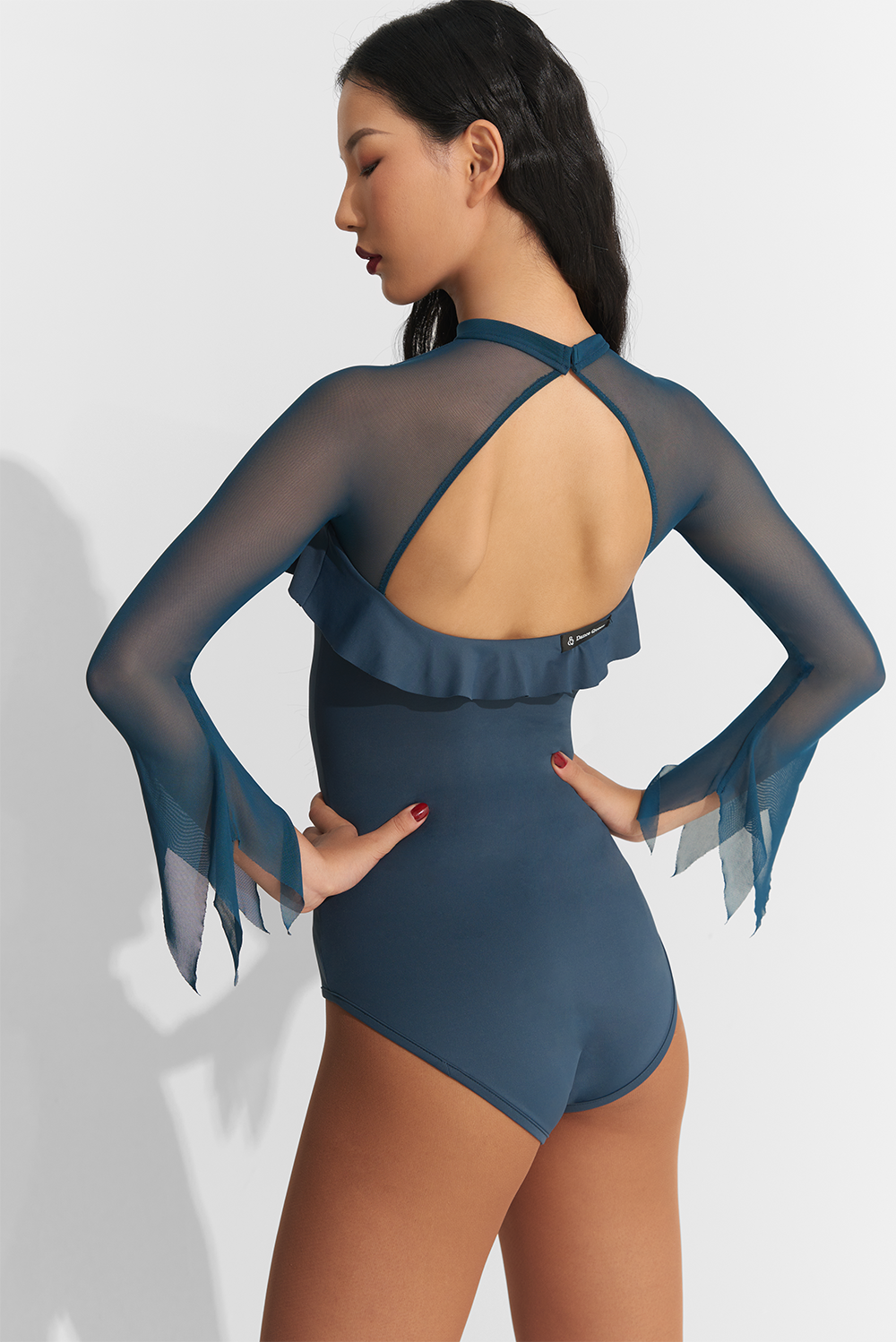 Experience the ultimate in comfort and style with the DANCE QUEEN 752 Blue Hollow Pleated Leotard. Designed for dancers, this leotard features a flattering hollow pleated design that allows for maximum movement and flexibility. Feel like a true dance queen in this must-have piece for your dance wardrobe!