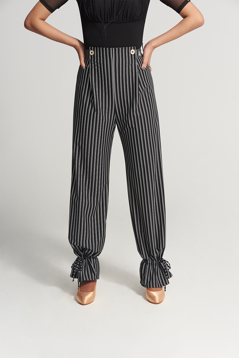 DANCE QUEEN 266-12 Training Trouser, designed for the ultimate dance experience. These trousers feature a sleek, black stripe down the side, adding a touch of sophistication to your look.