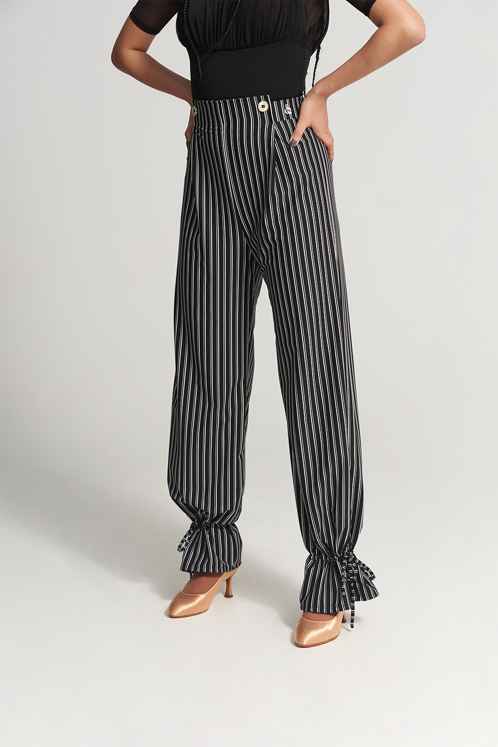 DANCE QUEEN 266-12 Training Trouser, designed for the ultimate dance experience. These trousers feature a sleek, black stripe down the side, adding a touch of sophistication to your look.