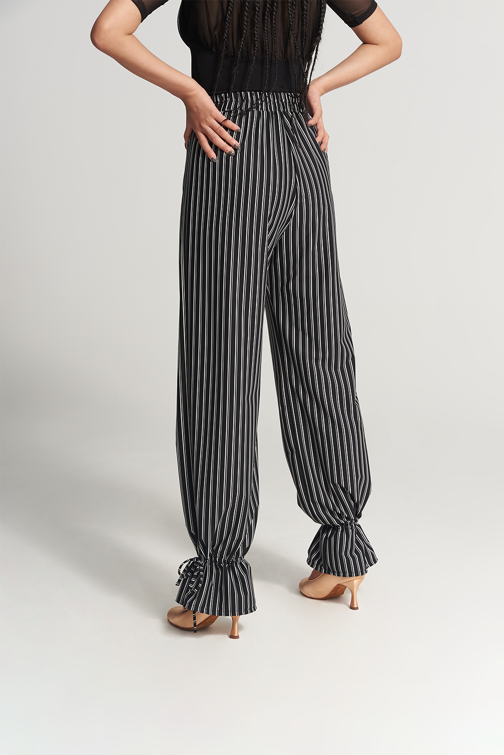 DANCE QUEEN 266-12 Training Trouser, designed for the ultimate dance experience. These trousers feature a sleek, black stripe down the side, adding a touch of sophistication to your look.