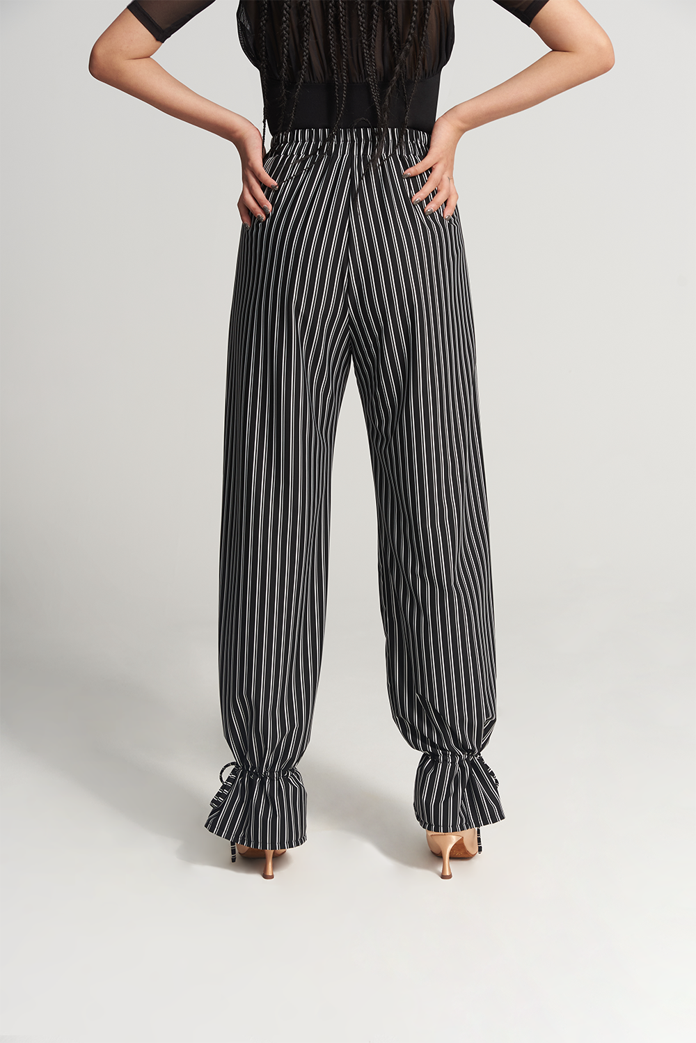 DANCE QUEEN 266-12 Training Trouser, designed for the ultimate dance experience. These trousers feature a sleek, black stripe down the side, adding a touch of sophistication to your look.