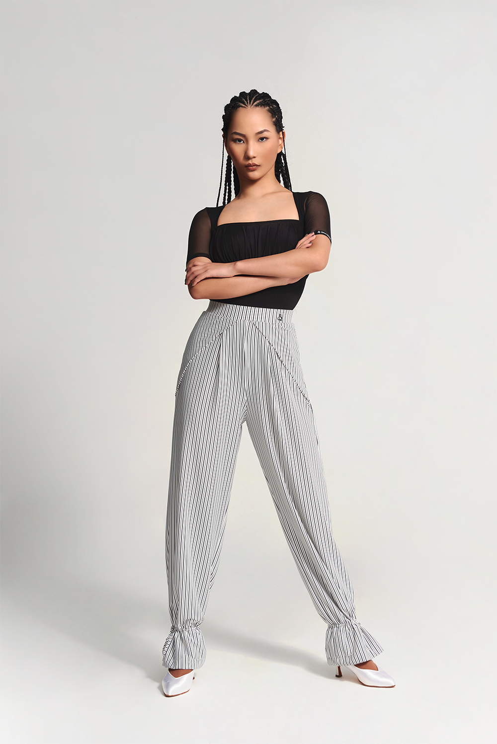 DANCE QUEEN 701-7 Black Strip Training Trouser  The ruffled design adds a touch of flair to this style, while the black strip provides a slimming and elongating effect.&nbsp;