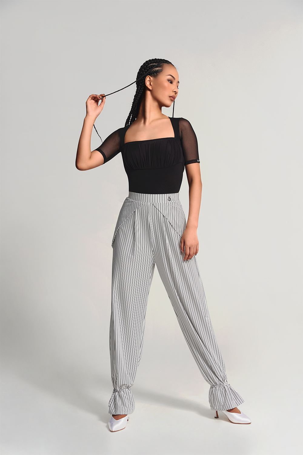 DANCE QUEEN 701-7 Black Strip Training Trouser  The ruffled design adds a touch of flair to this style, while the black strip provides a slimming and elongating effect.&nbsp;