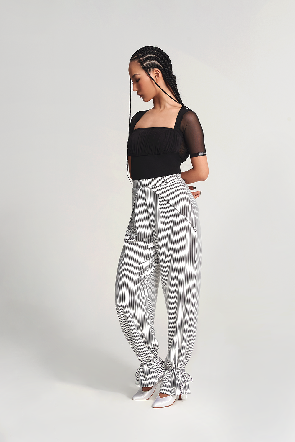 DANCE QUEEN 701-7 Black Strip Training Trouser  The ruffled design adds a touch of flair to this style, while the black strip provides a slimming and elongating effect.&nbsp;