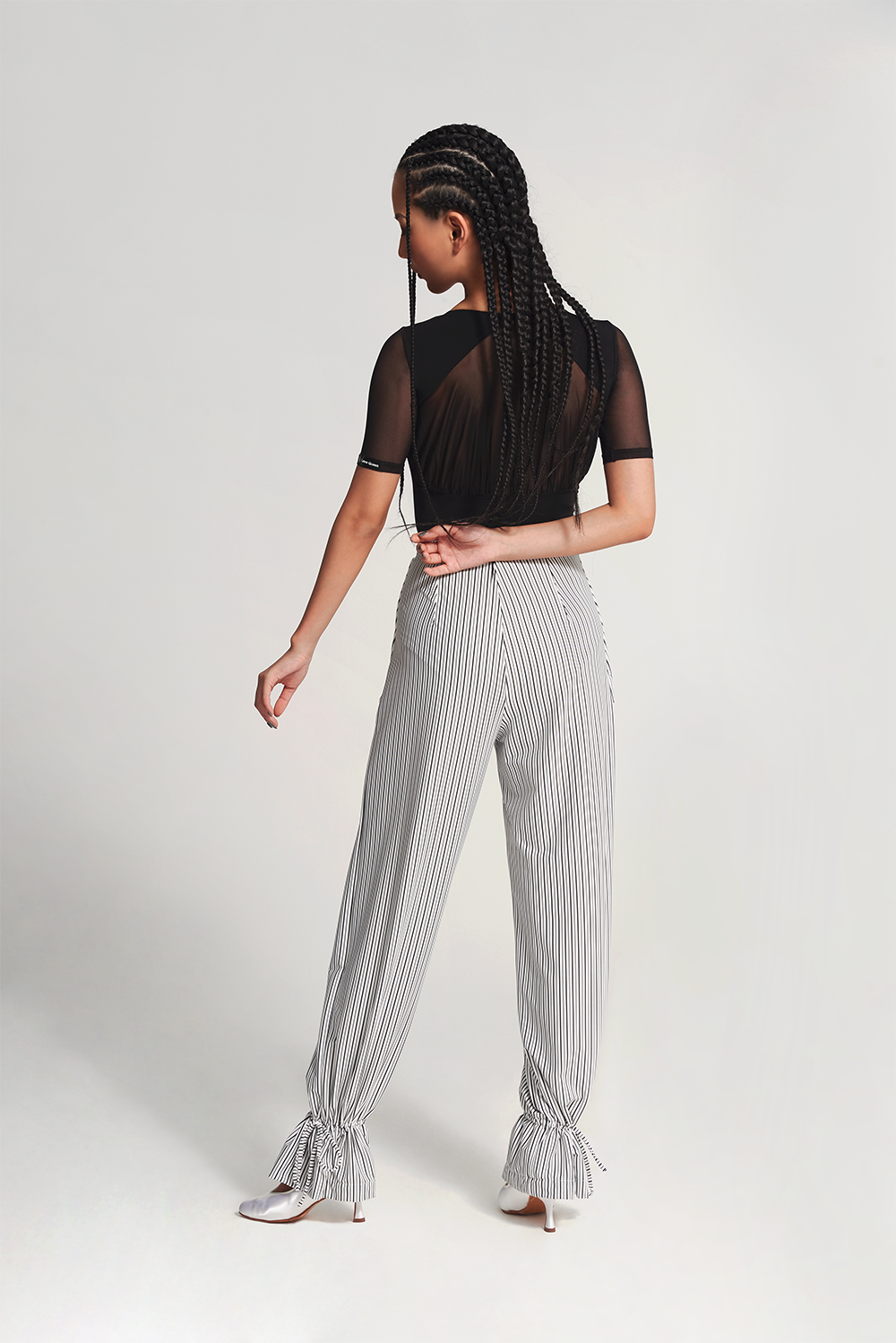 DANCE QUEEN 701-7 Black Strip Training Trouser  The ruffled design adds a touch of flair to this style, while the black strip provides a slimming and elongating effect.&nbsp;