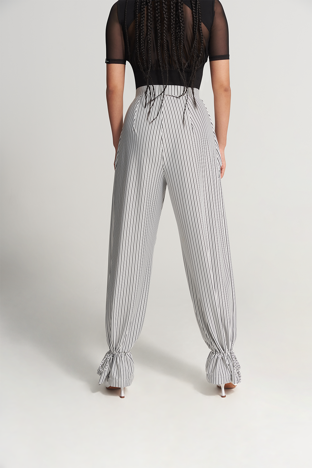 DANCE QUEEN 701-7 Black Strip Training Trouser  The ruffled design adds a touch of flair to this style, while the black strip provides a slimming and elongating effect.&nbsp;