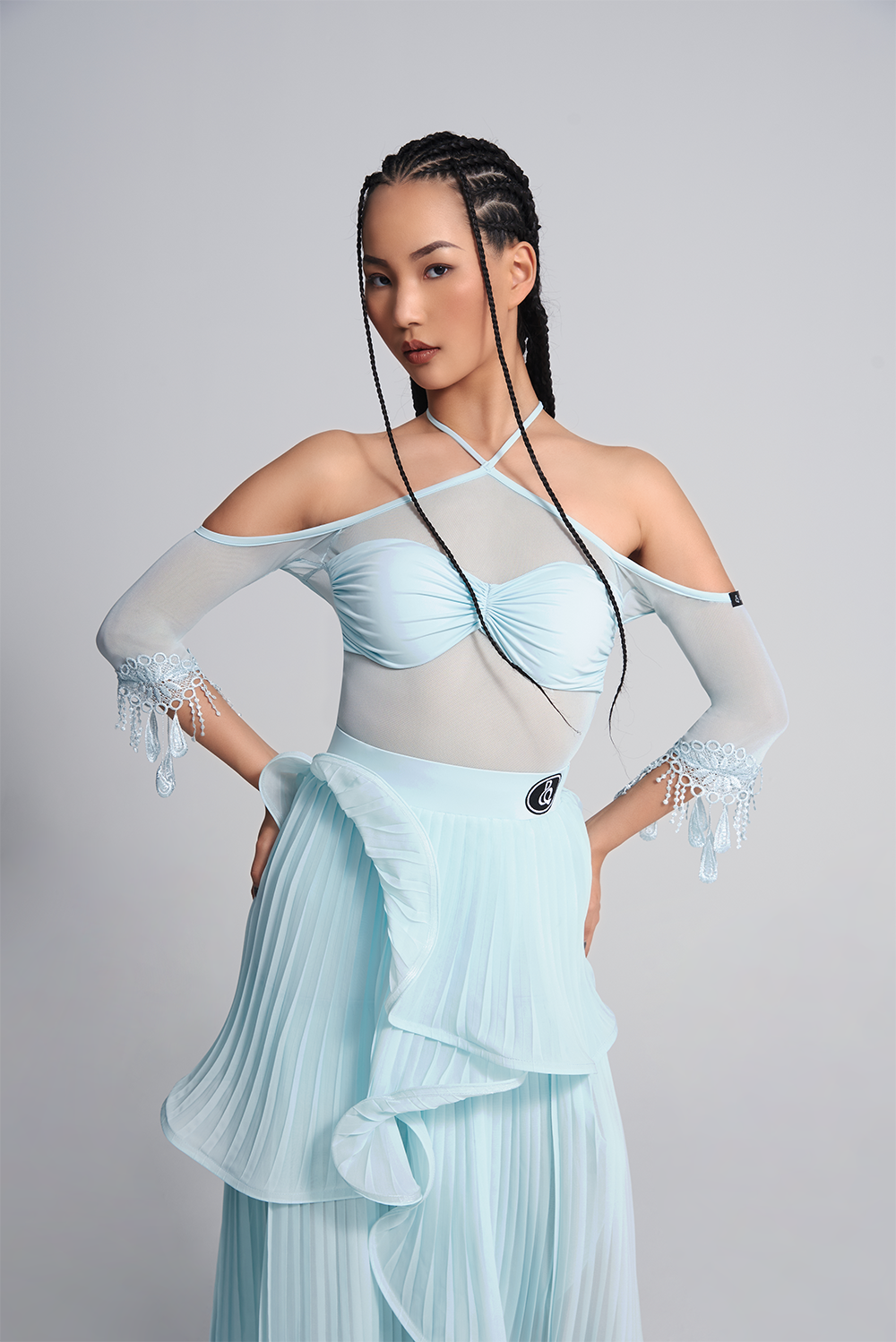 Be the star of the show in our DANCE QUEEN 410-2 Glacier Blue Halter off shoulder lace leotard. This stunning piece features a halter design and off shoulder cut for a flattering look. Made with delicate lace, it exudes elegance and grace. Perfect for dance practice.