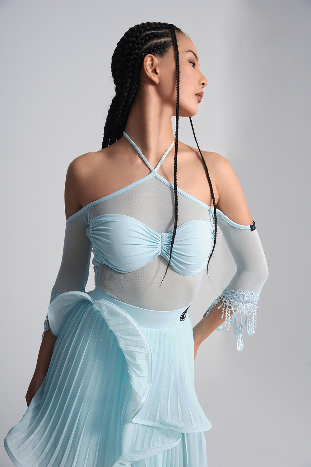 Be the star of the show in our DANCE QUEEN 410-2 Glacier Blue Halter off shoulder lace leotard. This stunning piece features a halter design and off shoulder cut for a flattering look. Made with delicate lace, it exudes elegance and grace. Perfect for dance practice.