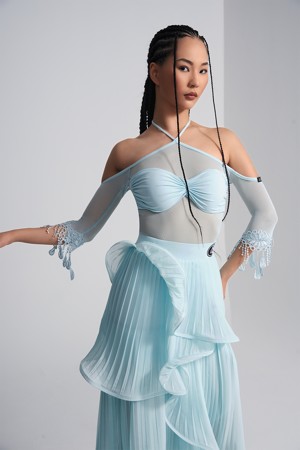 Be the star of the show in our DANCE QUEEN 410-2 Glacier Blue Halter off shoulder lace leotard. This stunning piece features a halter design and off shoulder cut for a flattering look. Made with delicate lace, it exudes elegance and grace. Perfect for dance practice.