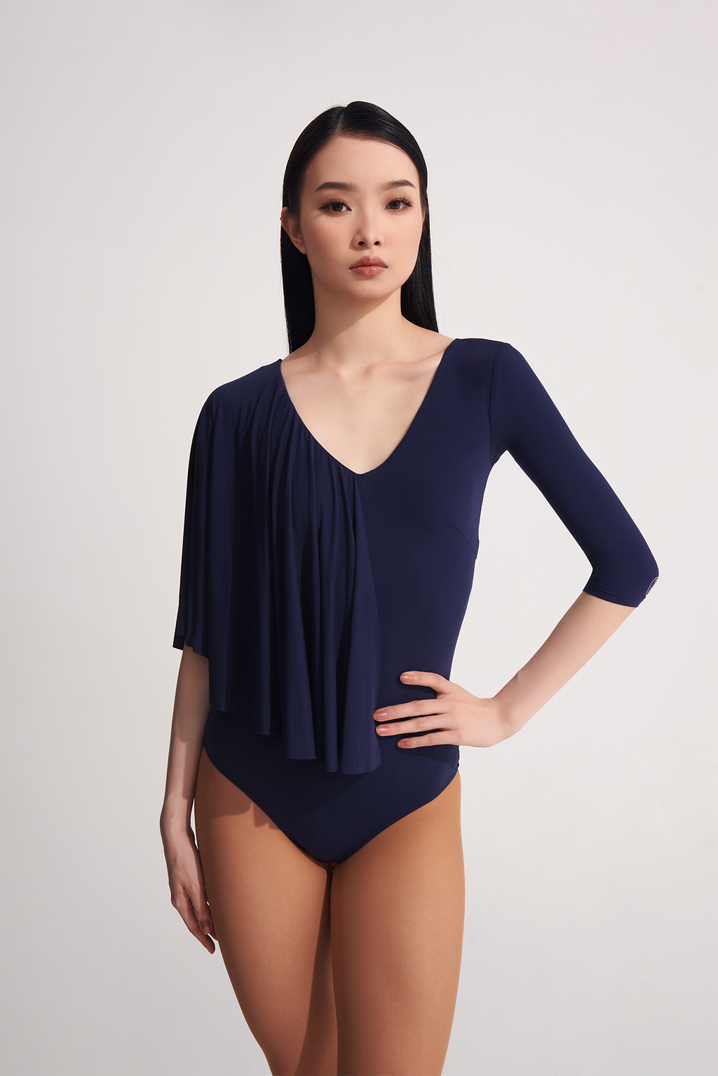 Looking for a stylish and comfortable leotard? Look no further than the DANCE QUEEN 693-5 Navy Blue Ruffle Leotard. With its ruffle detailing and navy blue color, this leotard will make you feel confident and elegant while you dance.