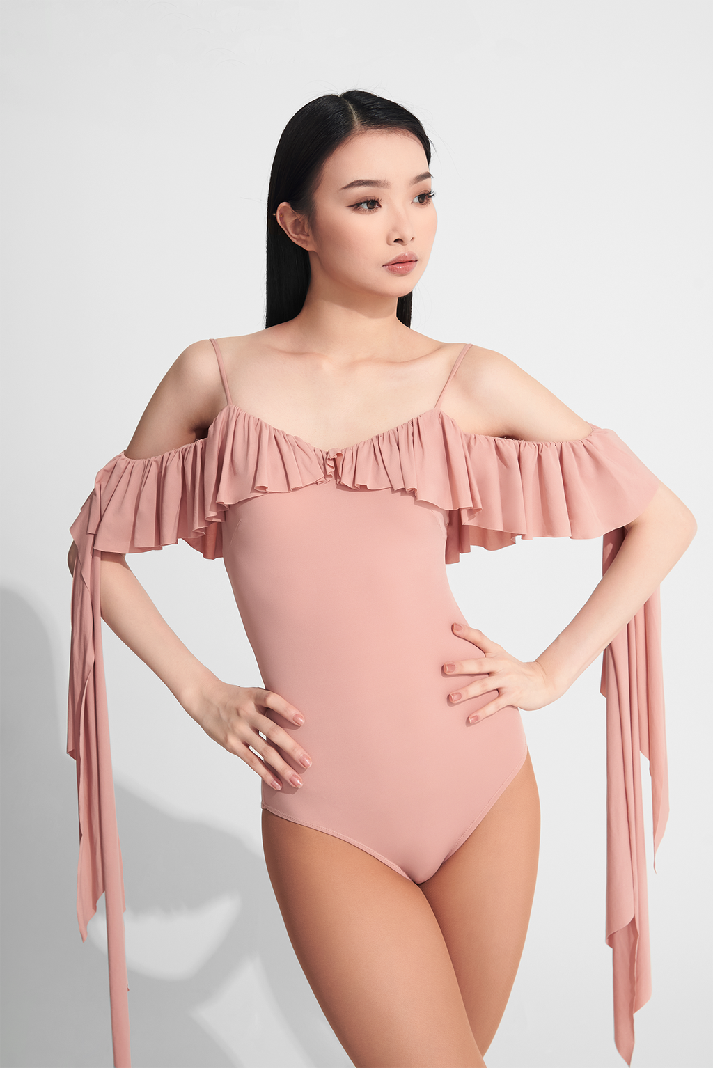 DANCE QUEEN 702-7 Misty Rose Suspenders Leotard. Made from super soft fabric, it offers ultimate comfort and a subtle, delicate touch. Perfect for those who demand a touch of elegance in their dance attire.