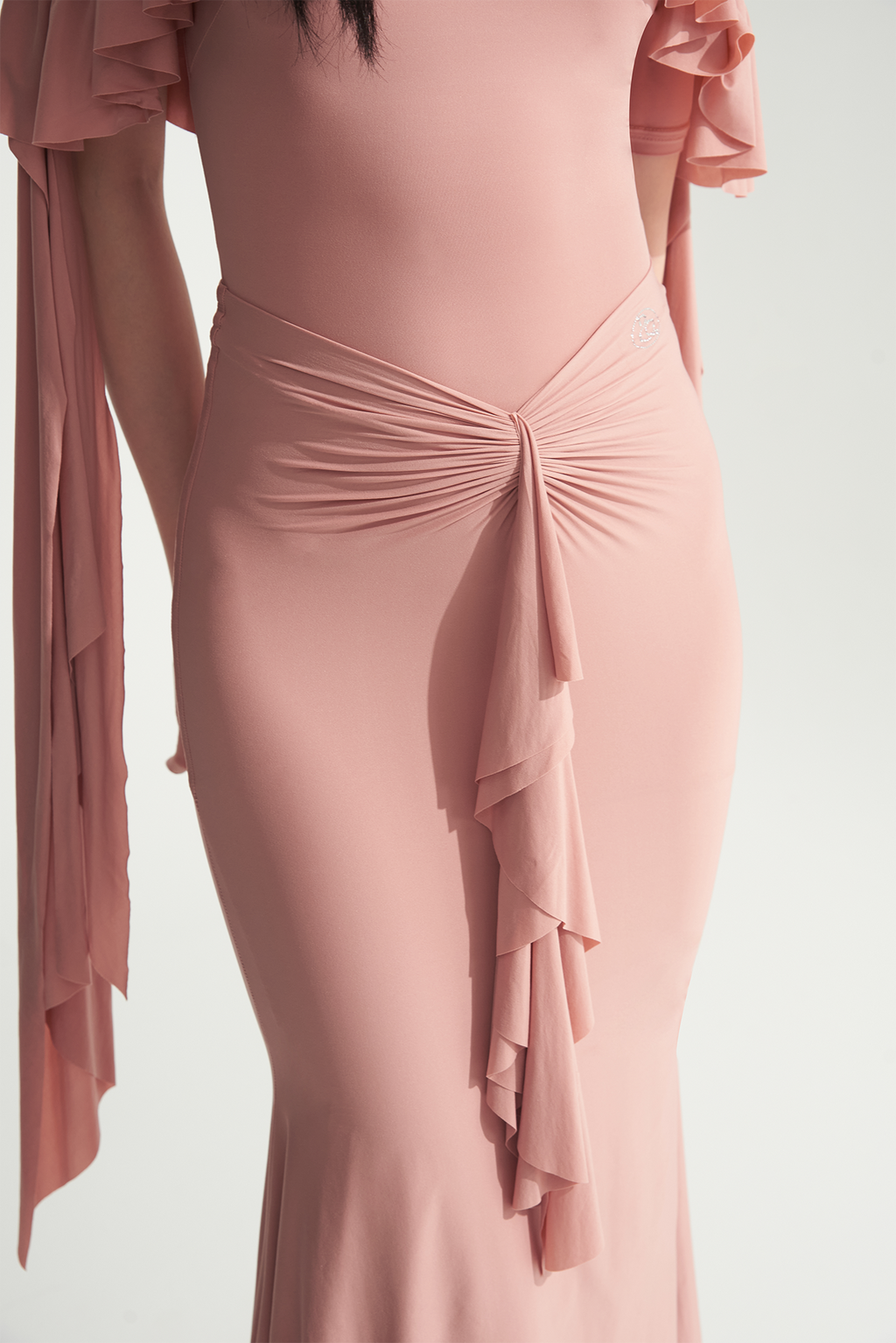 DANCE QUEEN 721-4 Misty Rose Ruffle High Elasticity Ballroom Skirt. This skirt features a stunning misty rose color with delicate ruffles and high elasticity, providing both style and comfort.