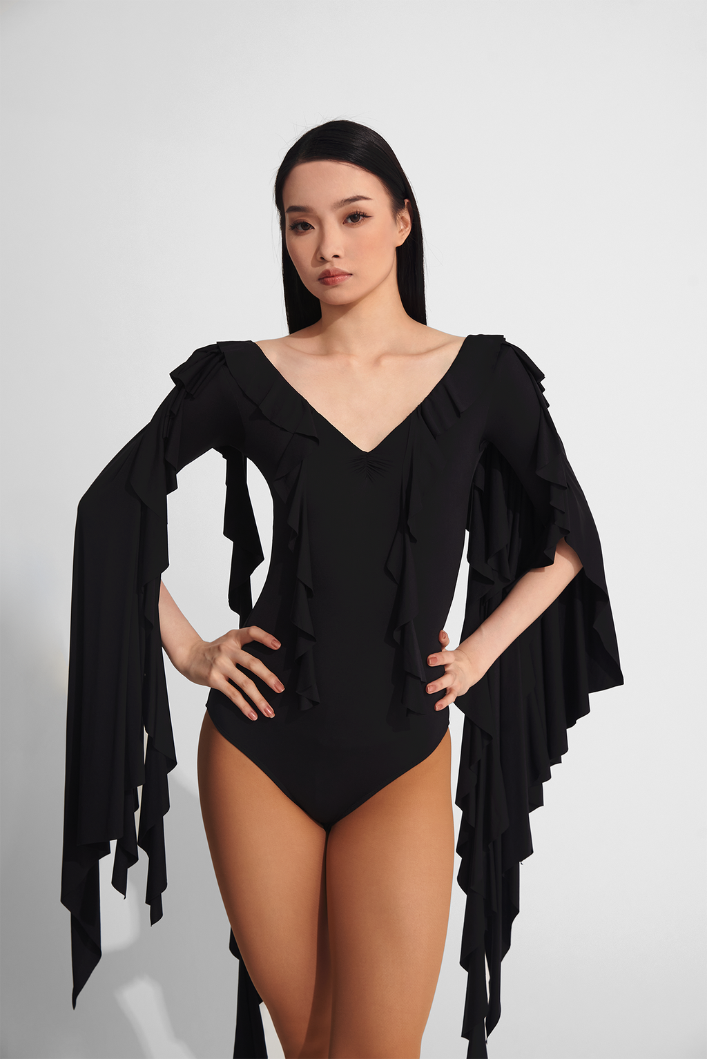 DANCE QUEEN 729 V neck pleated leotard - a luxurious and elegant addition to your dance wardrobe. The pleated design and V neck neckline add sophistication and grace, while the high-quality materials offer comfort and durability.&nbsp;