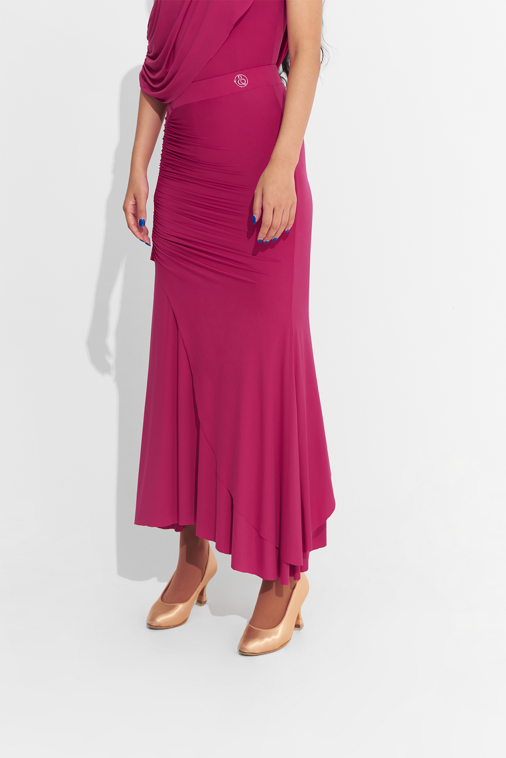 Elevate your dance performance with the DANCE QUEEN 660-5 Cherry Red High Elastic Pleated Ballroom Skirt. This stunning skirt features high-quality, stretchy fabric and elegant pleats that allow for effortless movement and maximum comfort. Stand out in style and feel confident on the dance floor with this must-have piece.