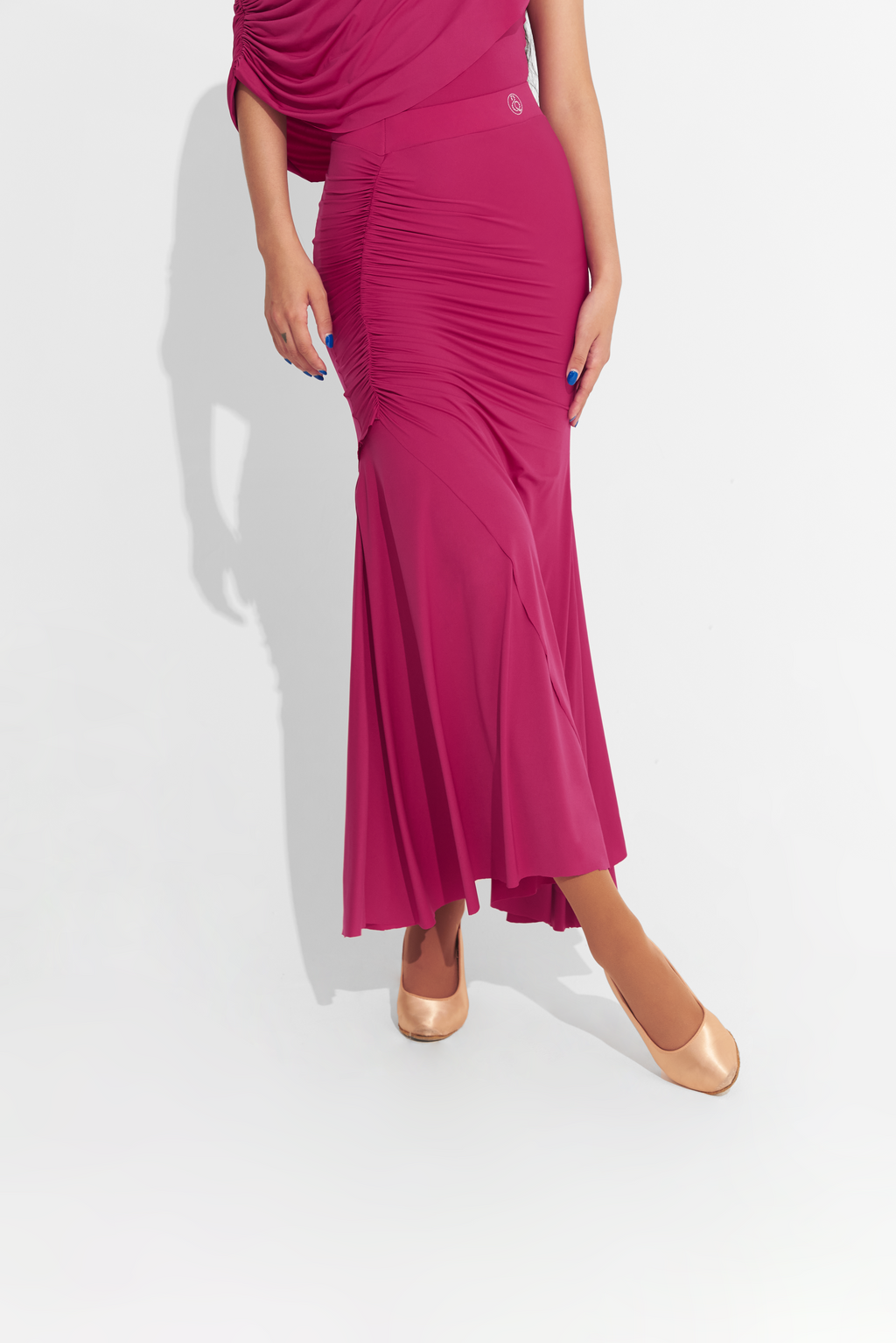 Elevate your dance performance with the DANCE QUEEN 660-5 Cherry Red High Elastic Pleated Ballroom Skirt. This stunning skirt features high-quality, stretchy fabric and elegant pleats that allow for effortless movement and maximum comfort. Stand out in style and feel confident on the dance floor with this must-have piece.