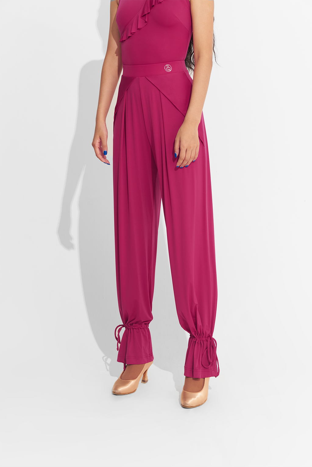 DANCE QUEEN 701-11 Cherry Red Ankle Strap Ballroom Training Trouser. With its ankle strap for perfect fit and cherry red color to make a statement, these trousers are perfect for training in style.