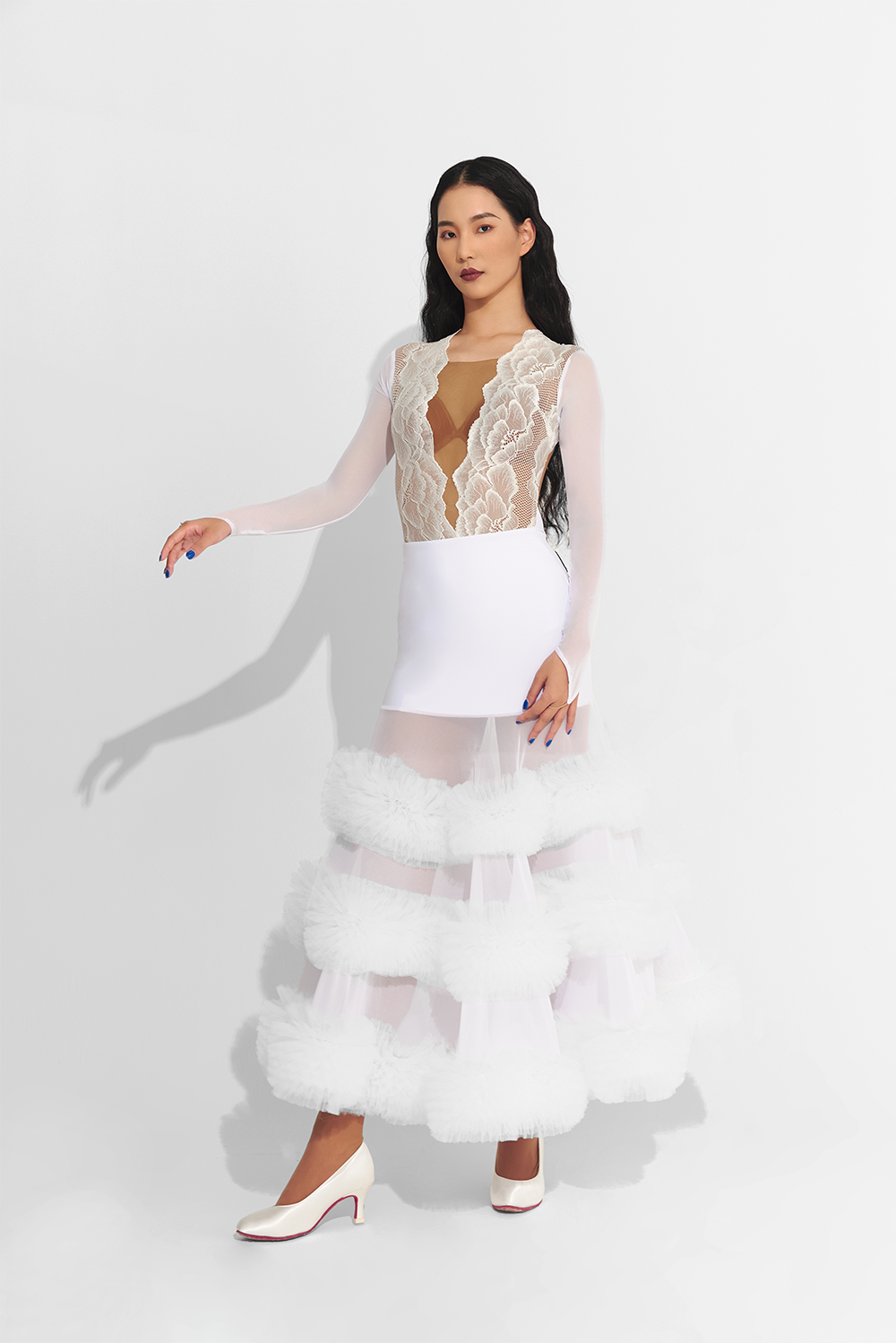 Unleash your inner dance queen in this custom dress featuring a white lace ruffle skirt. Make a statement on the dance floor with this bold and daring design. Perfect for the risk-taker who loves to stand out and shine!