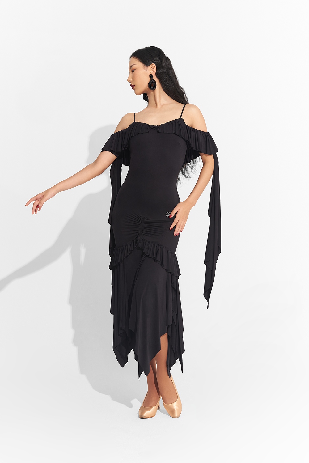 Take center stage in this elegant DANCE QUEEN 739 Black Off Shoulder Custom Dress. The sophisticated off shoulder design exudes luxury, while the custom fit ensures a perfect silhouette. Command attention and channel your inner queen with this exclusive piece.