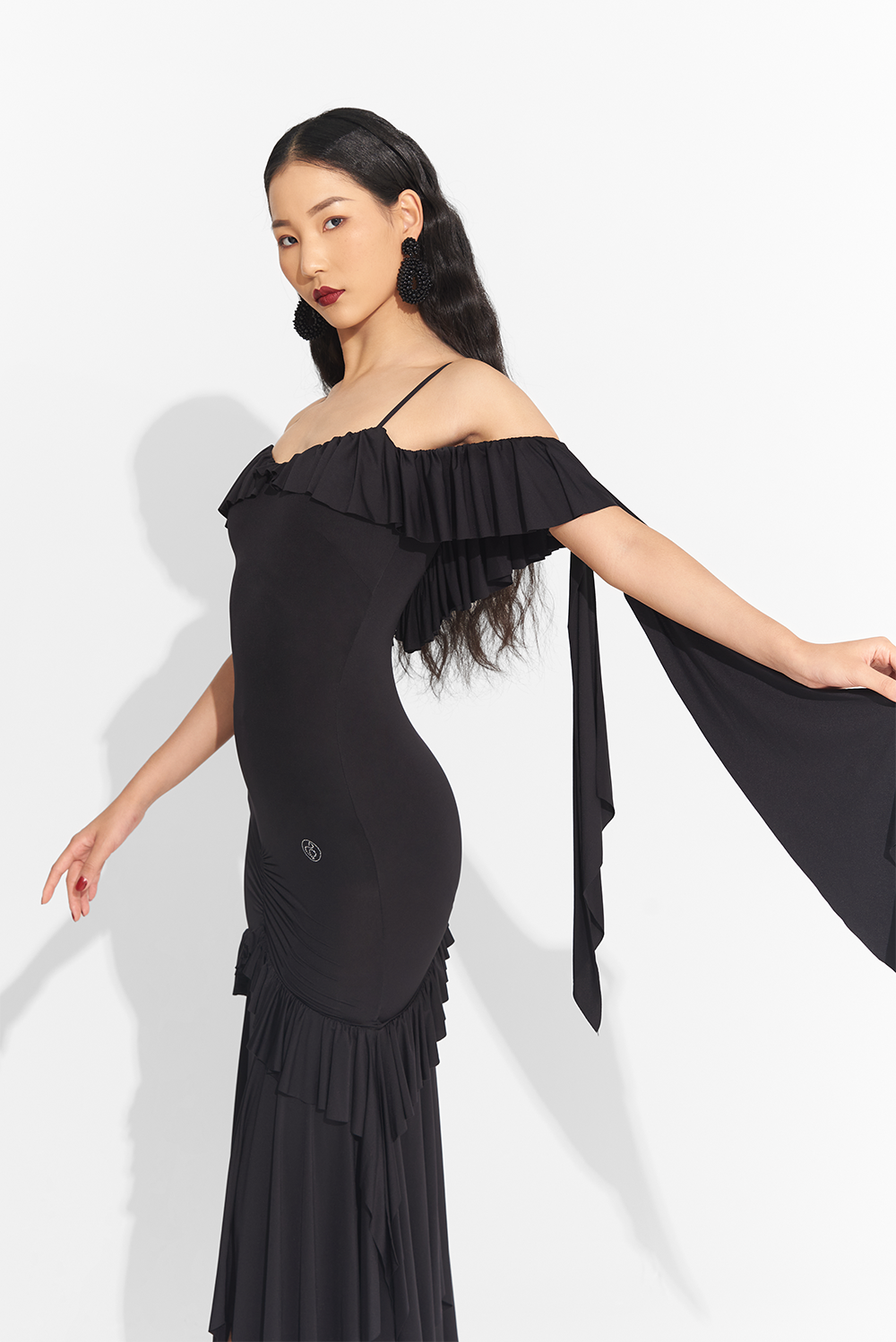 Take center stage in this elegant DANCE QUEEN 739 Black Off Shoulder Custom Dress. The sophisticated off shoulder design exudes luxury, while the custom fit ensures a perfect silhouette. Command attention and channel your inner queen with this exclusive piece.