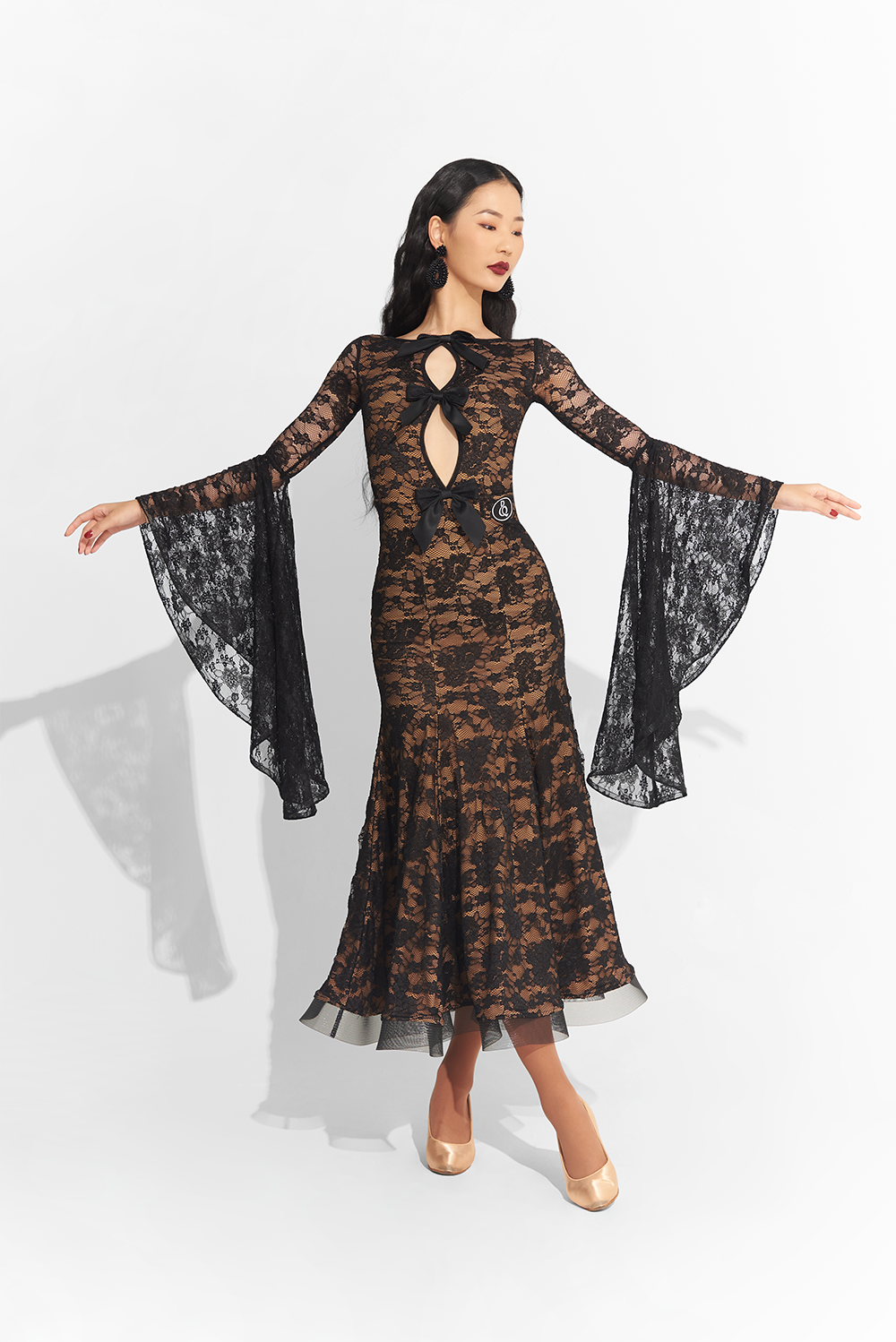 This DANCE QUEEN 758 Black Hollow Lace Custom Dress is perfect for any queen of the dance floor. The intricate lace design adds a touch of elegance, while the custom fit ensures maximum comfort and confidence. Step into the spotlight with this stunning dress.