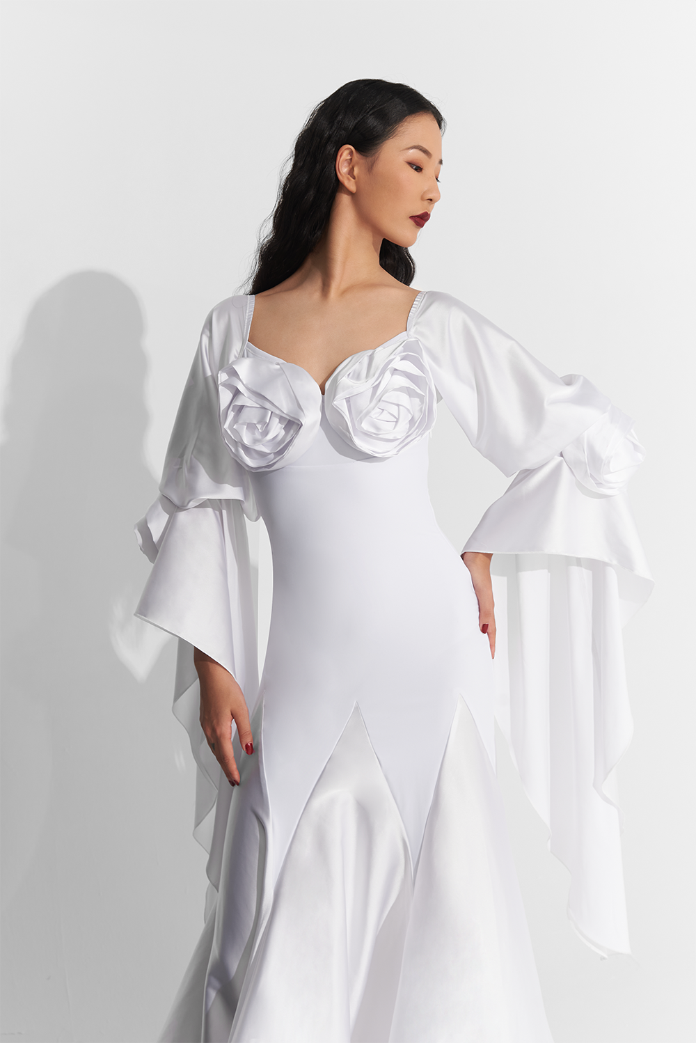 Indulge in the ultimate luxury with our DANCE QUEEN 738 dress, featuring elegant white flower embellishments and a customizable fit. This exquisite piece will make you feel like a queen on the dance floor, elevating your style and confidence to new heights.