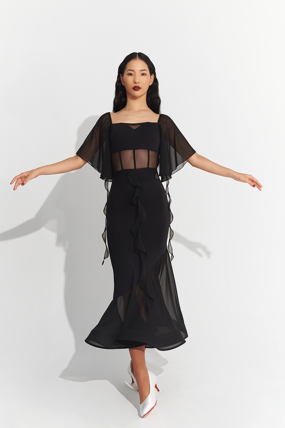 Made from high-quality mesh, this dress offers a perfect fit and elegant draping. Show off your unique style with custom options and dance the night away in confidence and comfort.