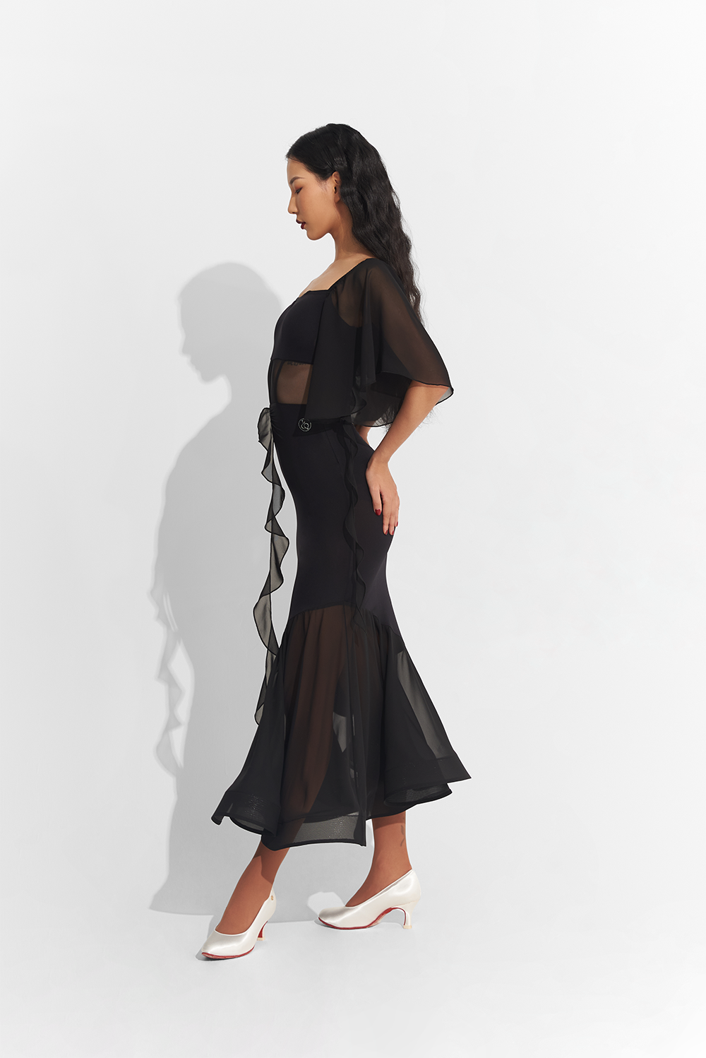 Made from high-quality mesh, this dress offers a perfect fit and elegant draping. Show off your unique style with custom options and dance the night away in confidence and comfort.