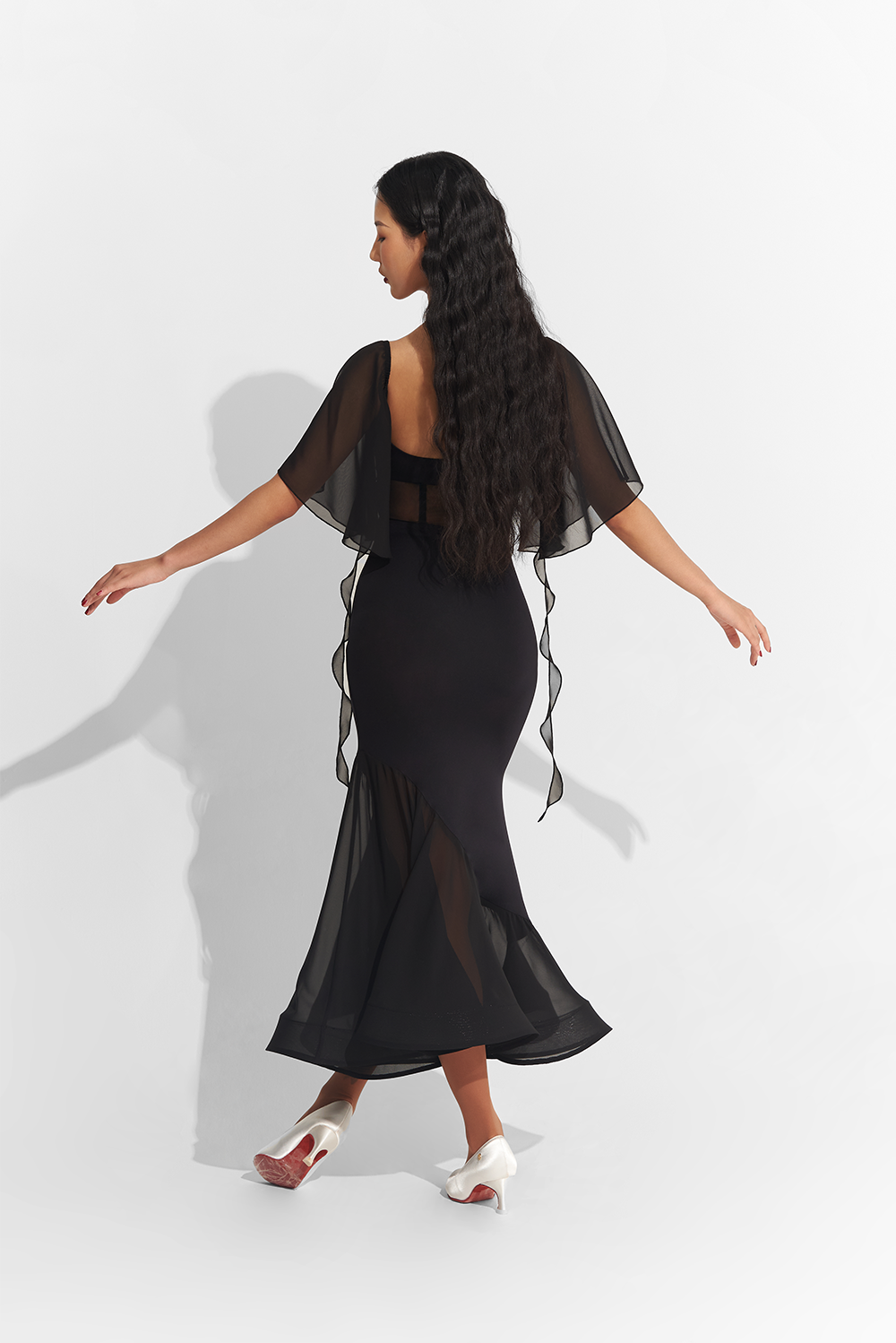 Made from high-quality mesh, this dress offers a perfect fit and elegant draping. Show off your unique style with custom options and dance the night away in confidence and comfort.