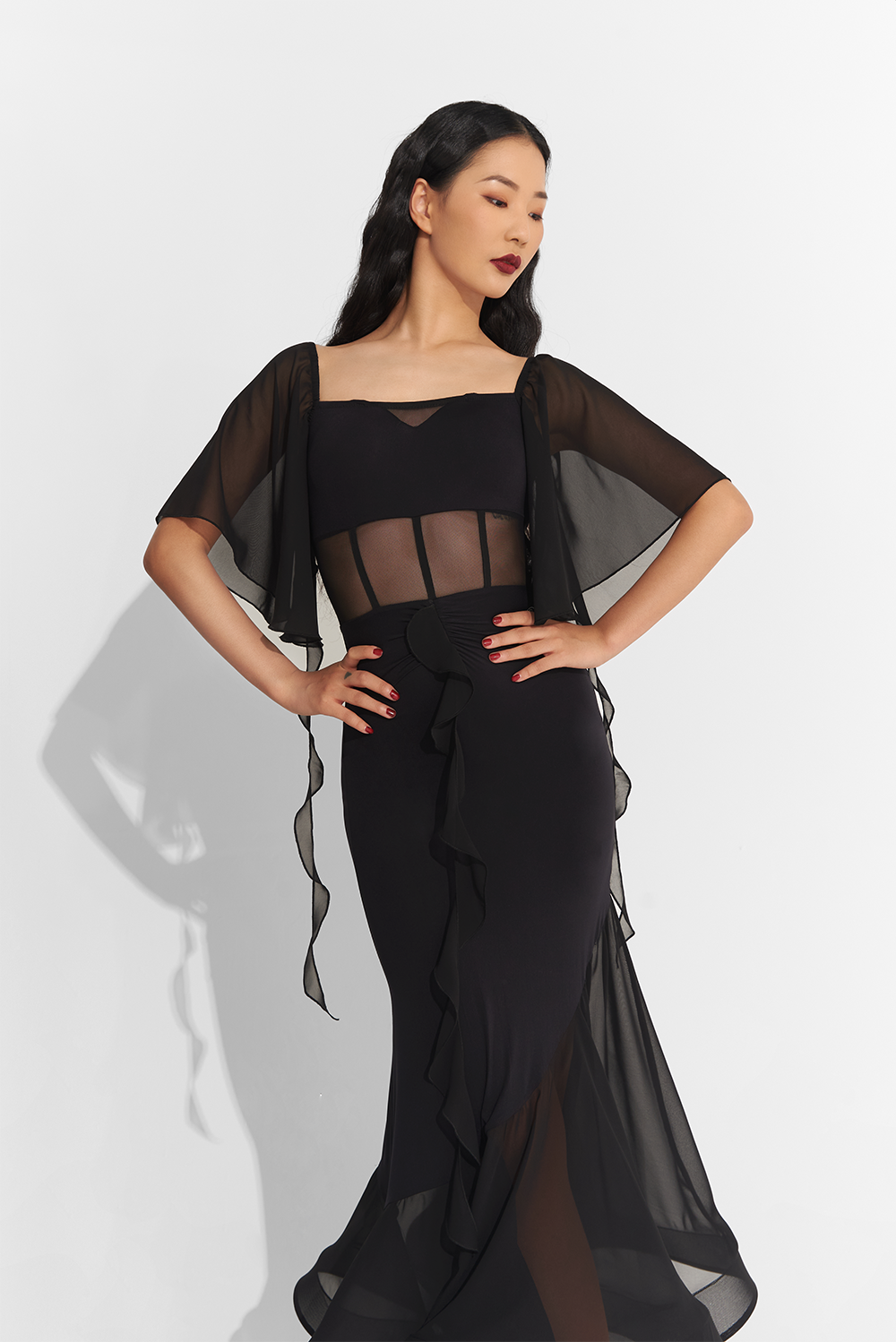 Made from high-quality mesh, this dress offers a perfect fit and elegant draping. Show off your unique style with custom options and dance the night away in confidence and comfort.