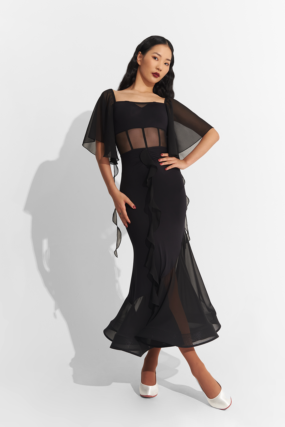 Made from high-quality mesh, this dress offers a perfect fit and elegant draping. Show off your unique style with custom options and dance the night away in confidence and comfort.