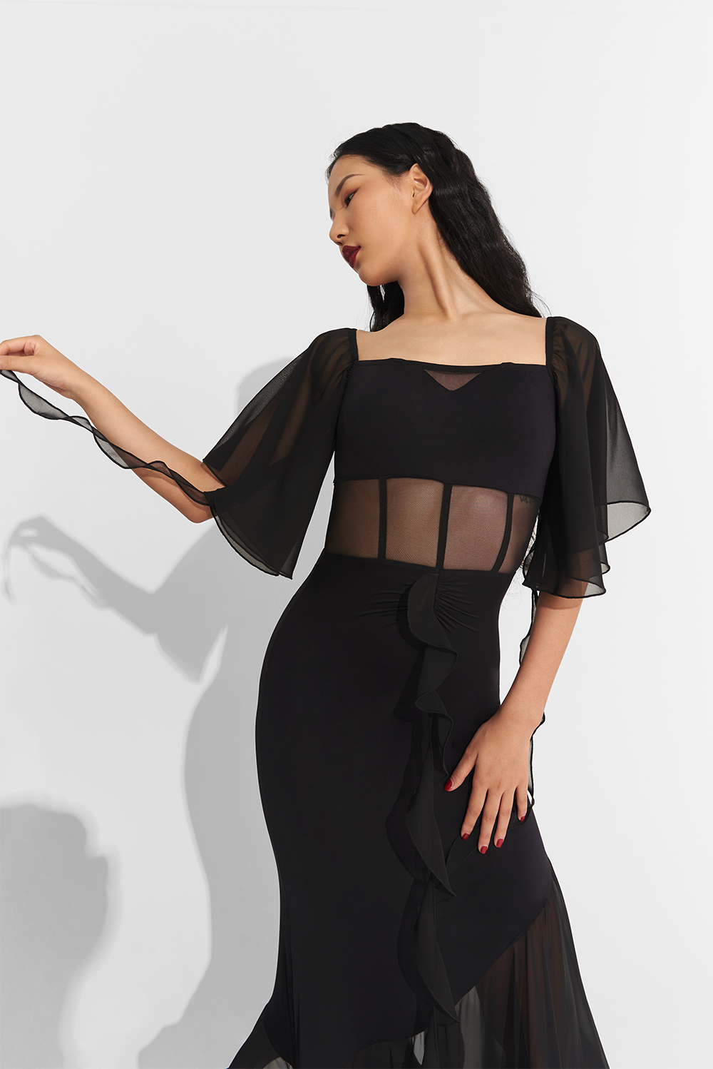 Made from high-quality mesh, this dress offers a perfect fit and elegant draping. Show off your unique style with custom options and dance the night away in confidence and comfort.