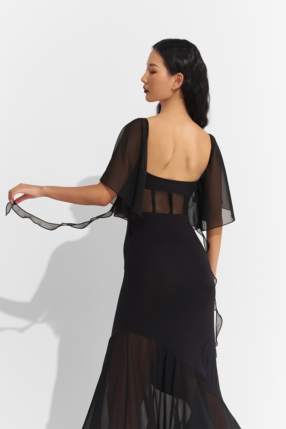 Made from high-quality mesh, this dress offers a perfect fit and elegant draping. Show off your unique style with custom options and dance the night away in confidence and comfort.