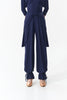 DQ1144-9 Navy Modern Trousers – Crystal-adorned logo, sculpted waist with bow accent, and refined tapered cuffs. Exclusive Edition.
